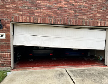 Crashed Garage Door Repair Services by Overhead Door Solutions in Texas