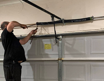 Garage Door Spring Repair Services by Overhead Door Solutions in Texas